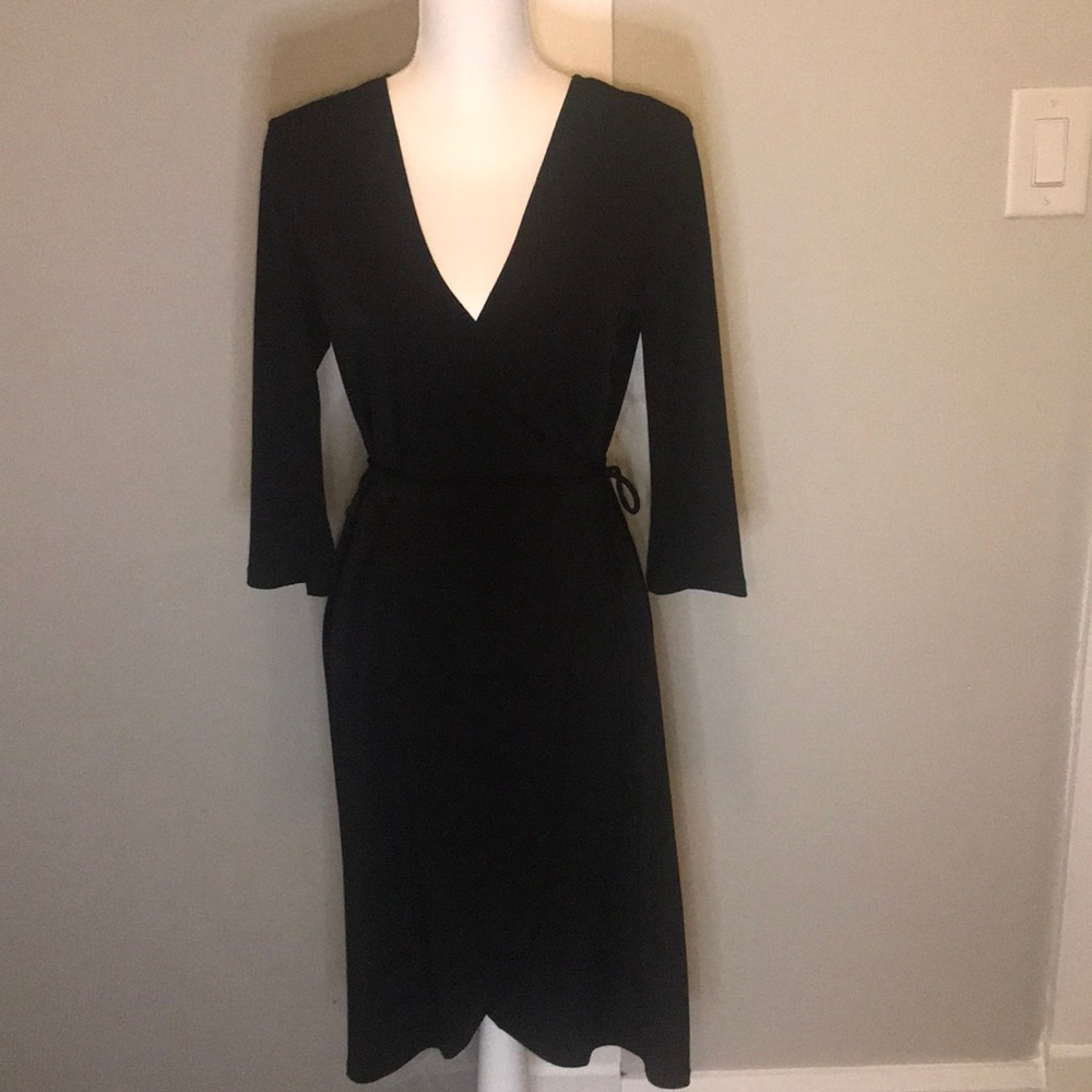 Black Form Fitting Wrap-style dress!